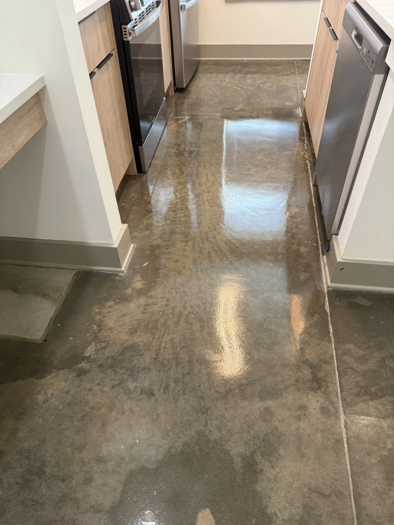 Industrial floor cleaning specialists using ride-on scrubber machines