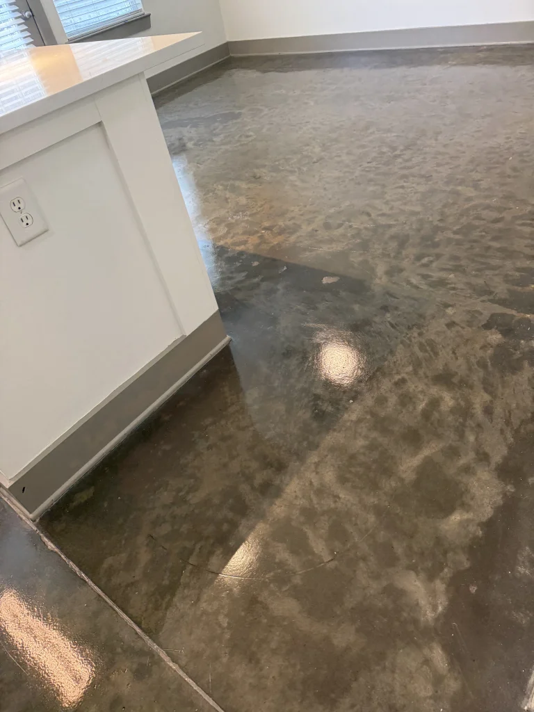 Warehouse floor cleaning crew working on polished concrete floors